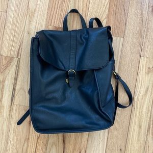 Black target faux leather backpack